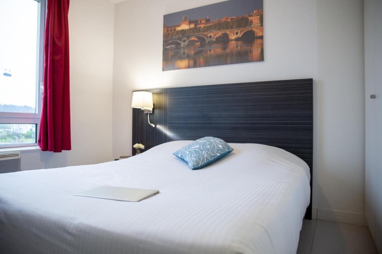 Zenitude Hotel-Residences Toulouse Fluvia Bagian luar foto