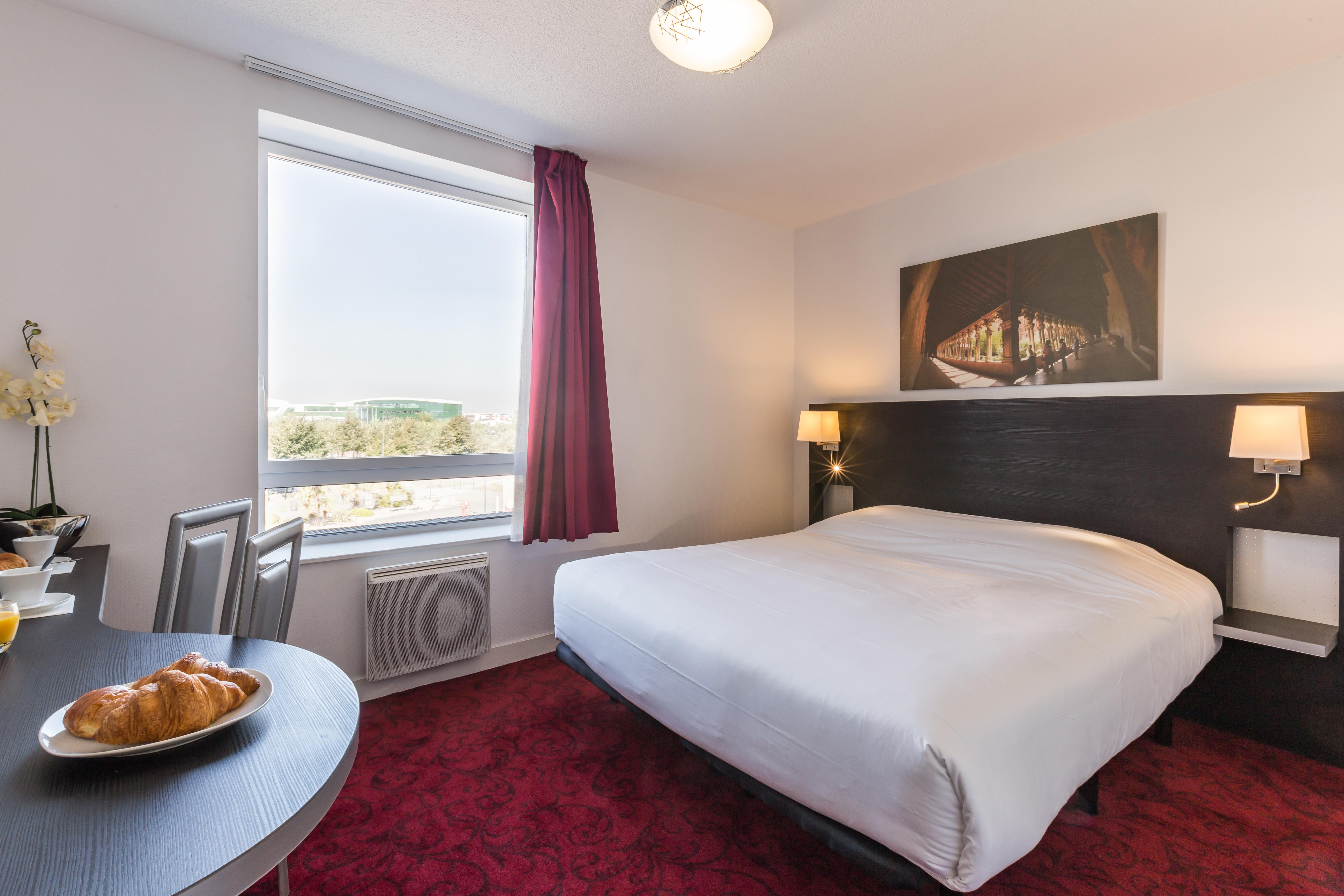Zenitude Hotel-Residences Toulouse Fluvia Bagian luar foto