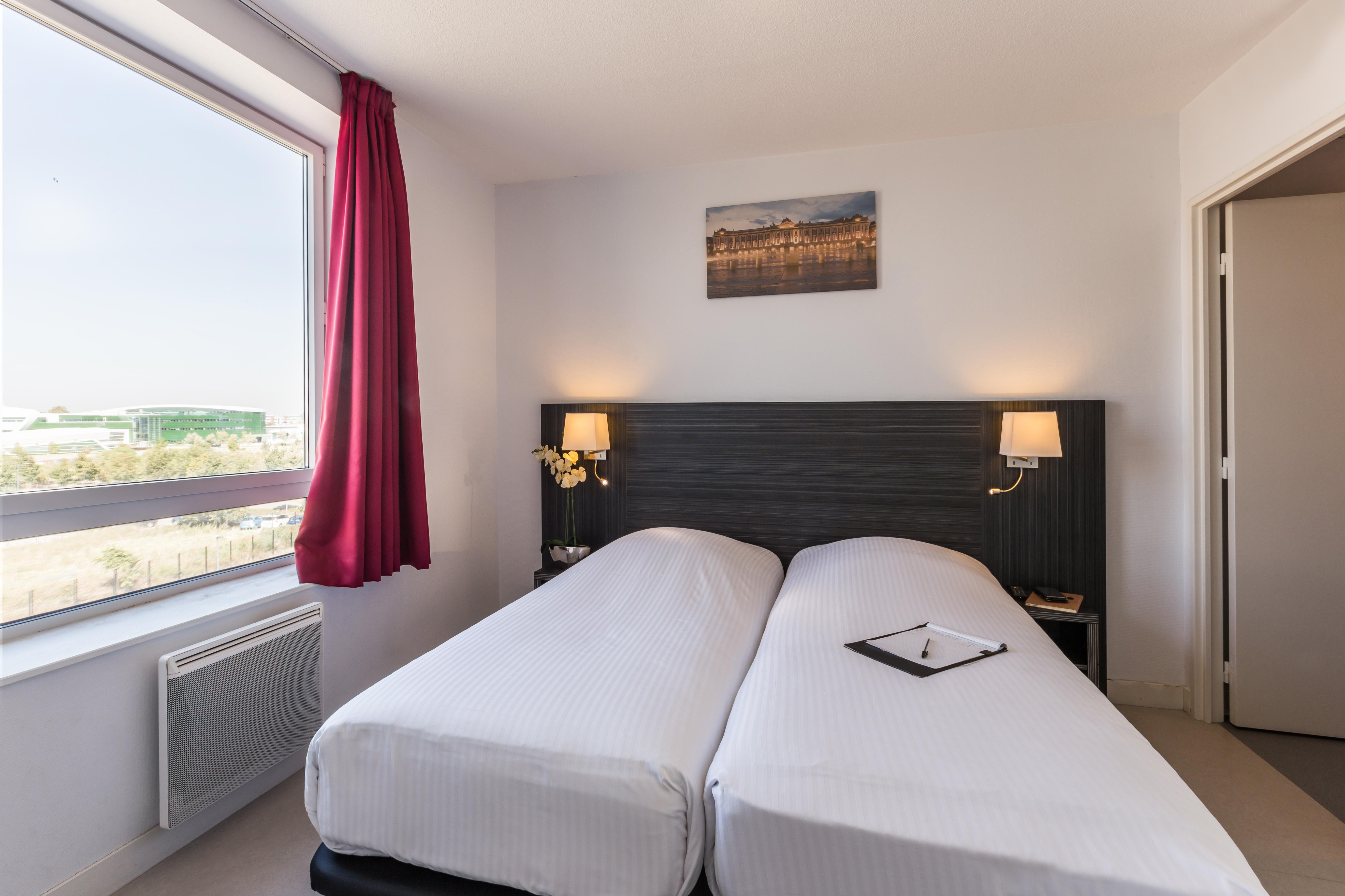 Zenitude Hotel-Residences Toulouse Fluvia Bagian luar foto
