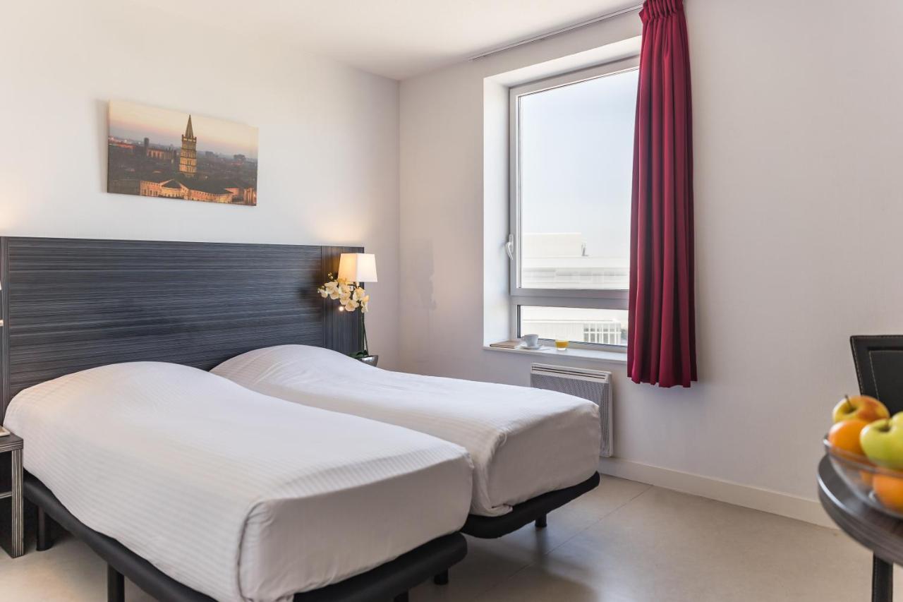 Zenitude Hotel-Residences Toulouse Fluvia Bagian luar foto
