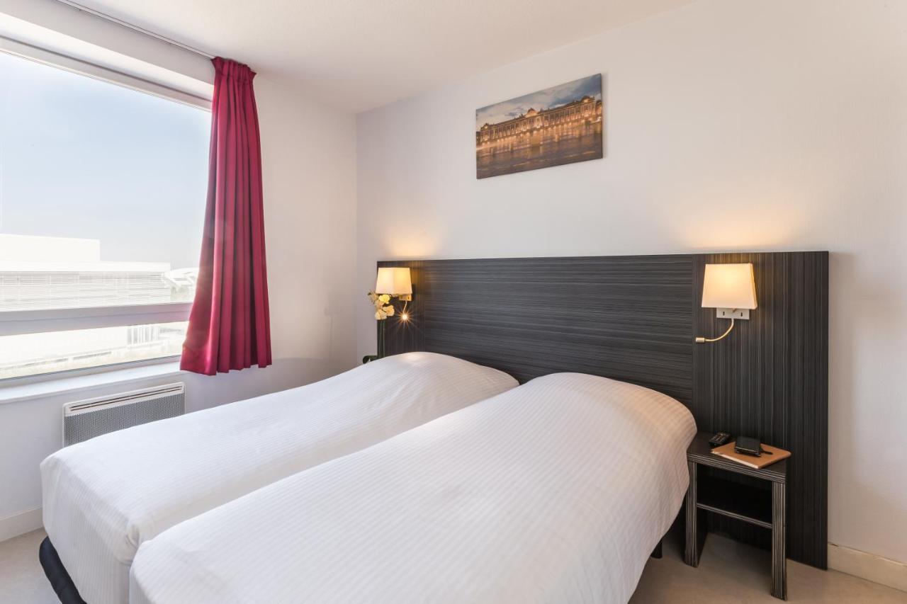 Zenitude Hotel-Residences Toulouse Fluvia Bagian luar foto